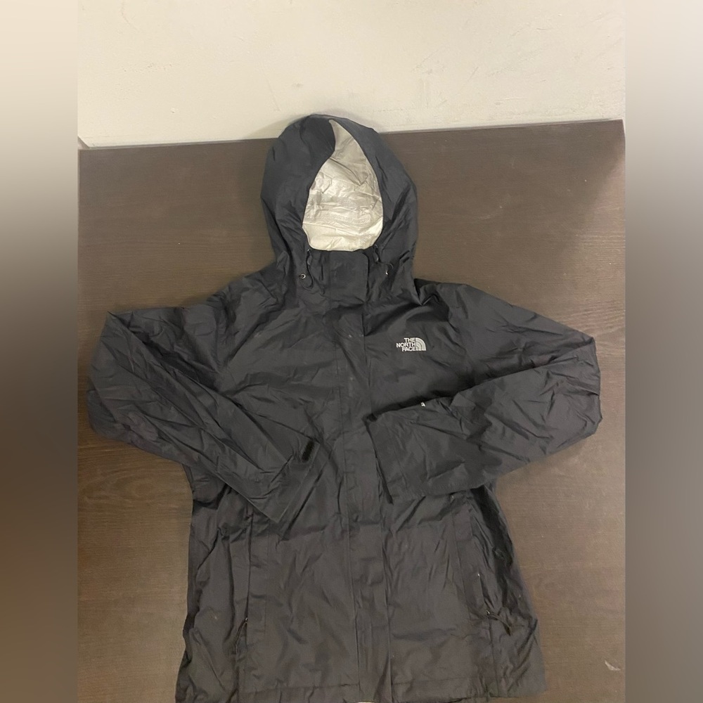 Womens North Face, black rain jacket, size medium.